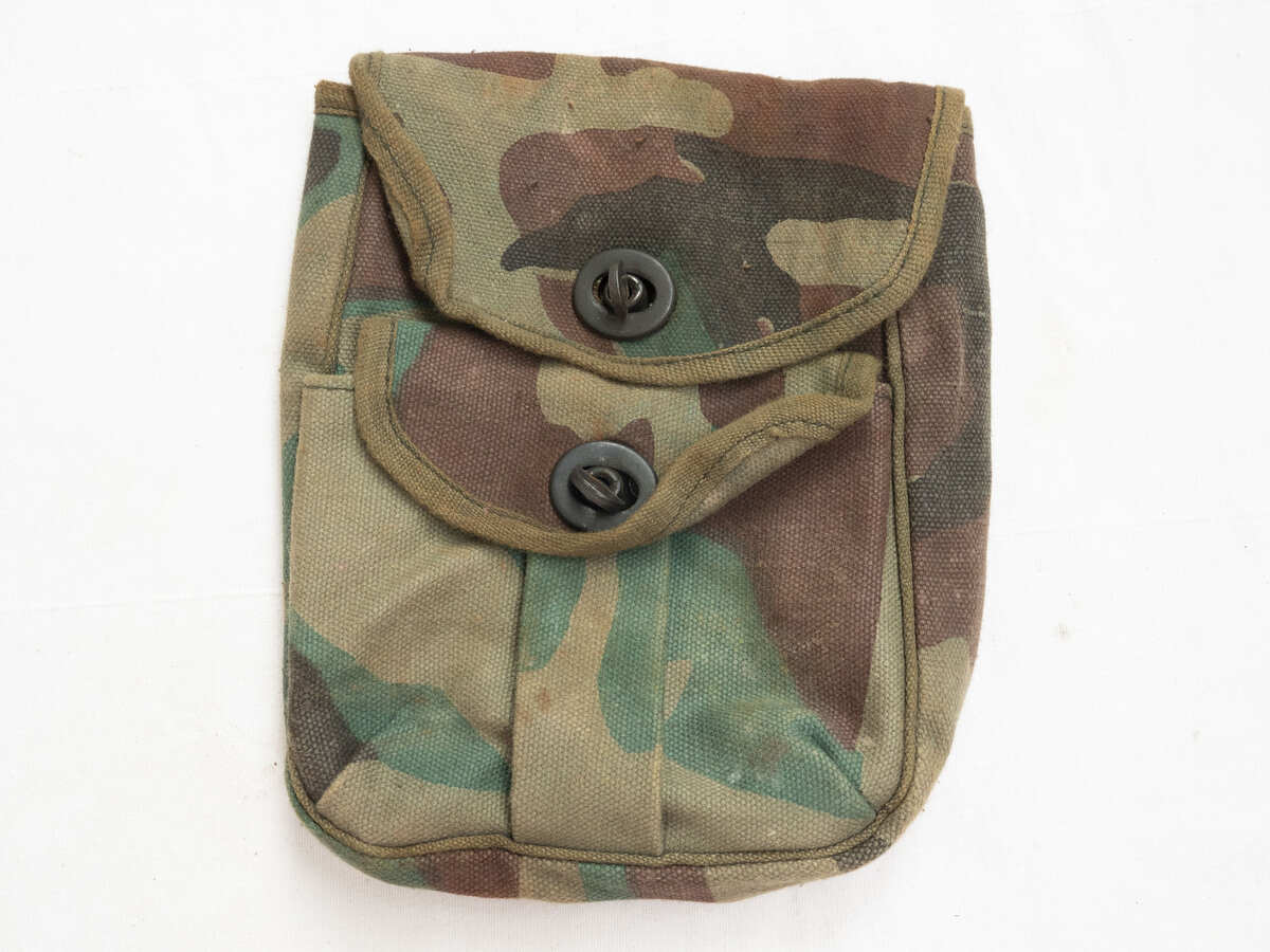 Camo canvas belt pouch, paint stain on back?