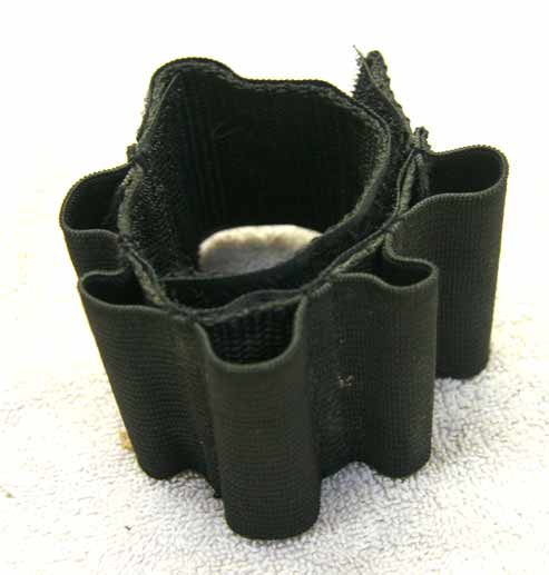Black 12 gram or tube wrist band, used good shape, elastic holds its shape