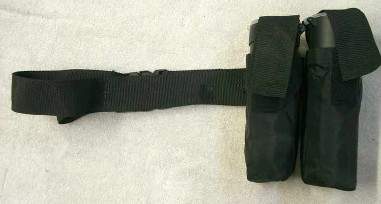 Black 2 pod pack, attached to belt (sewn), used decent shape, 100rd pods not included