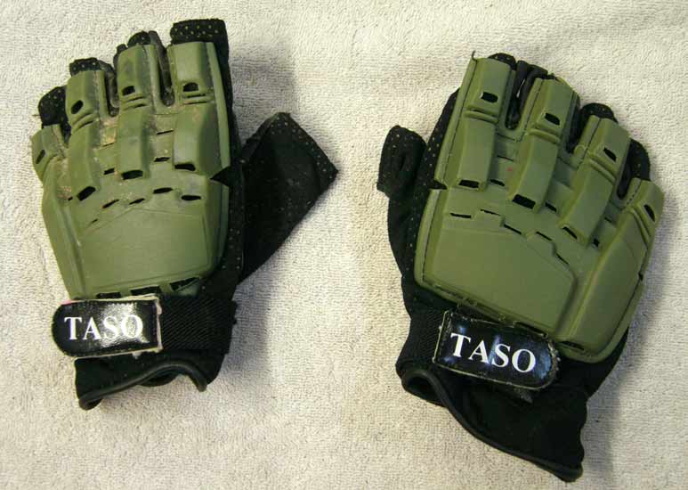 pair of Taso green armor gloves, used shape, large? Stiching on fingers are coming undone