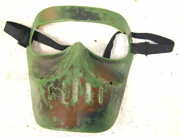 bad shape woodtalk mask, with extra face holes cut in and eye/nose bridge cut out, has strap, bad shape, NOT SAFE TO USE!