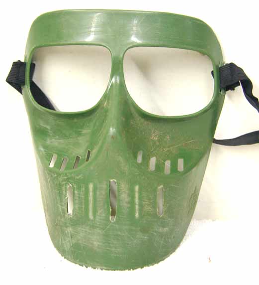 bad decent shape woodtalk mask, with extra face holes cut for vents in mouth, has strap (good shape), NOT SAFE TO USE! Sanded?