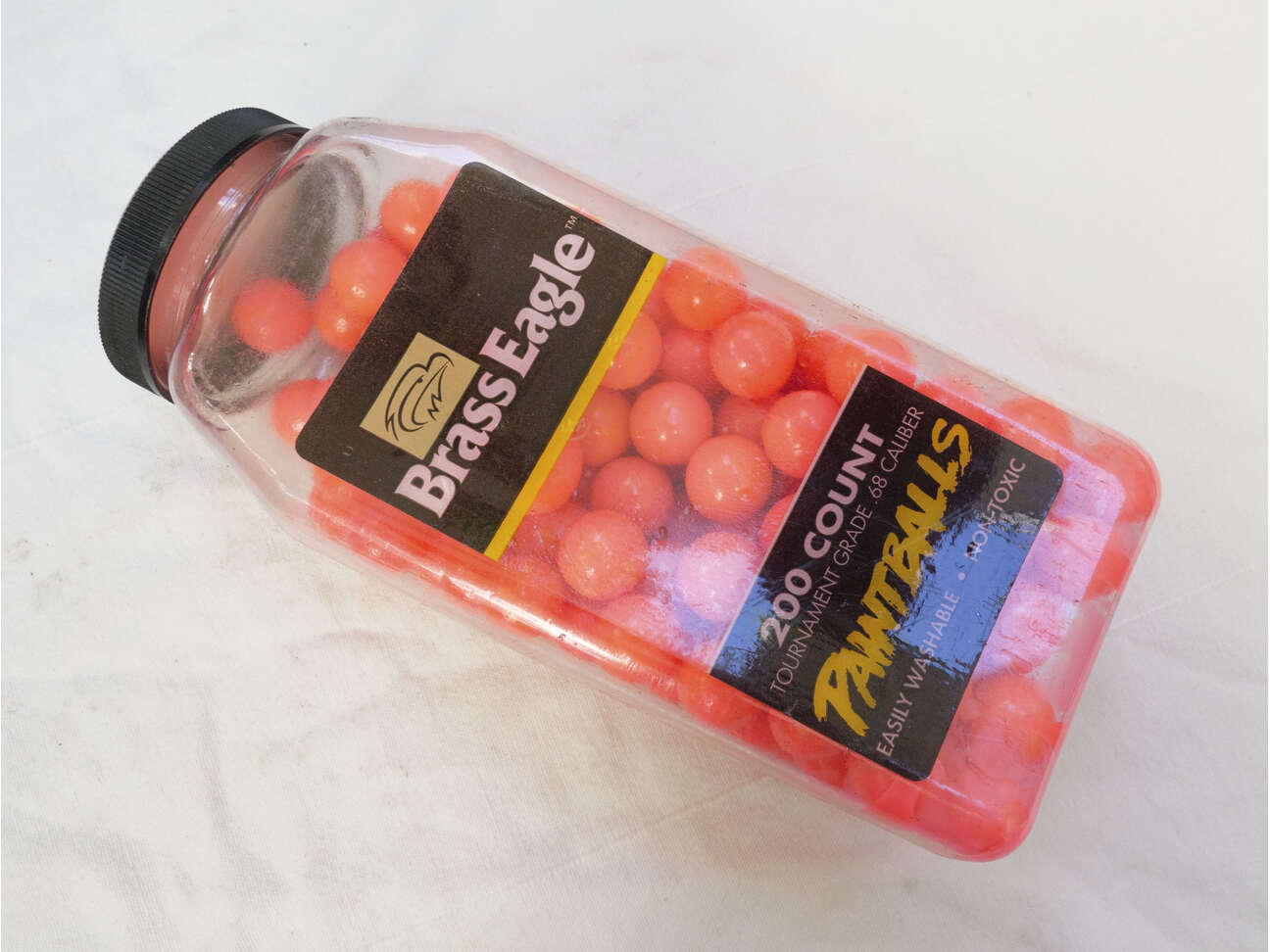Mid 90s Brass Eagle Paintballs in Bright Neon Red/Orange, slimy
