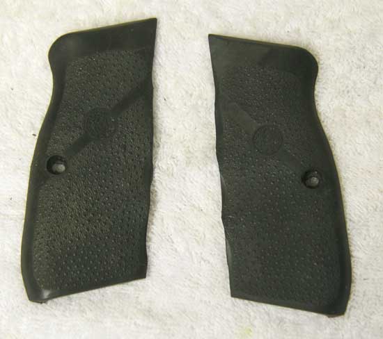 CZ-75 hogue grips turned to panels, used cut