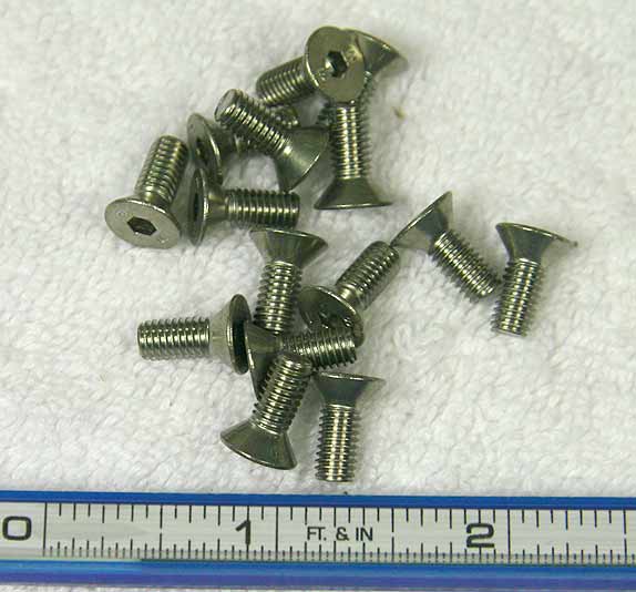 ¼ inch 10x32 flat head Machine allen screw in stainless steel. One included