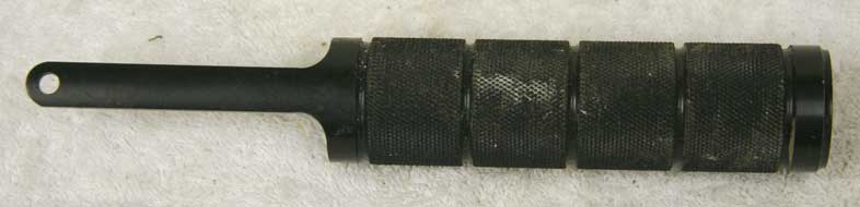 Challenger? Knurled black plastic pump handle, 1 and 1/16 id. Used shape, dirty
