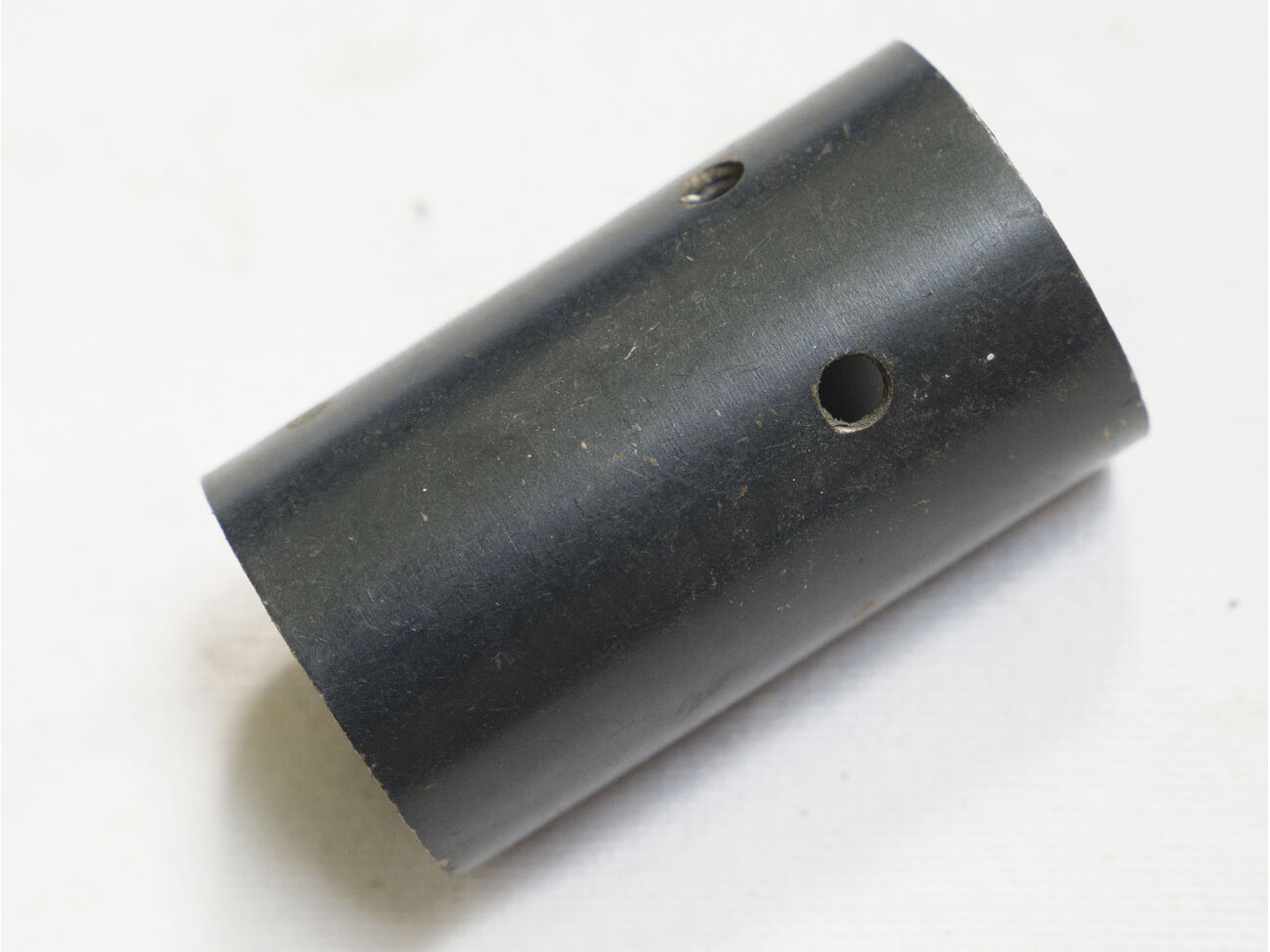 Stock Nelspot barrel sleeve, steel. Used but pretty clean.