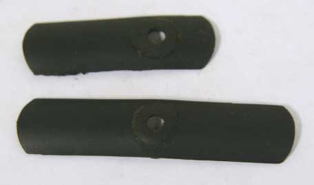 nelson dual pump arm slot covers in black in bad shape with cushions
