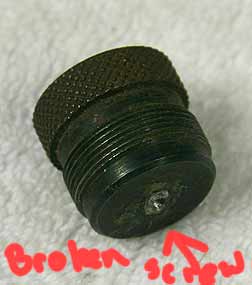 Sheridan 12 gram screw in bad shape with screw broken off in it.