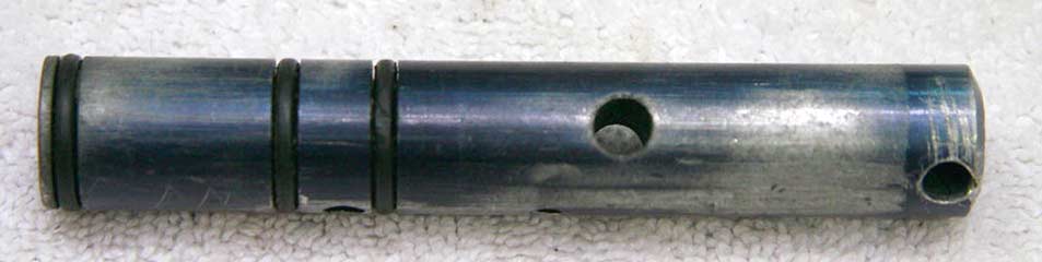 Sheridan P series bolt, light wear on base, has ding at pump arm rod