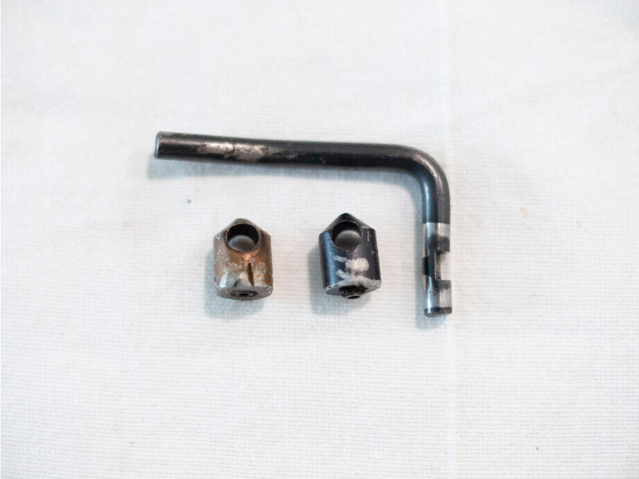 Bad shape Auto trigger kit for Sheridan pumps, with discolored arm stops