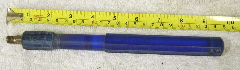 vm valve tool in blue, used, drilled for T handle, threads are ground down